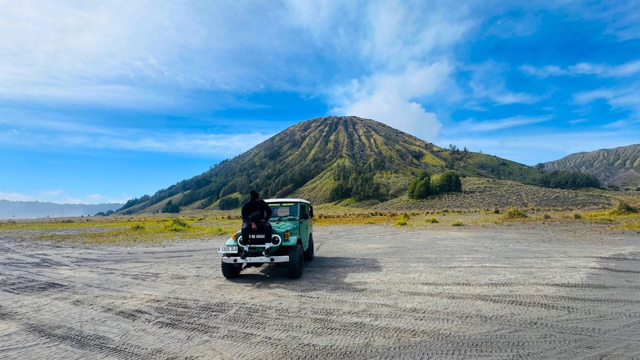 Jeep on the sea of sand Mt Bromo Indonesia