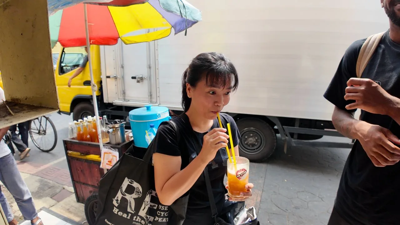 Local friends drinking Bir Kotjok
