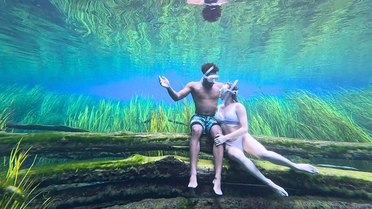 Beth and Denz underwater at Paisu Pok Lake
